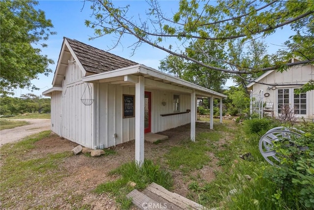 view of side of home featuring board and batten siding