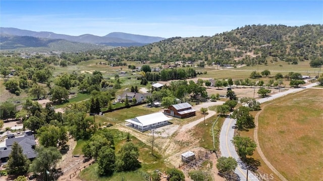 drone / aerial view of a mountainous background