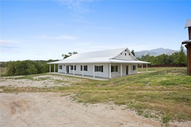 view of front facade featuring a mountain view