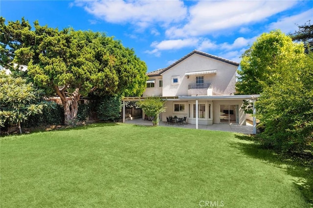 159 N San Marino Ave, San Gabriel, CA 91775 - rear view of house with a yard, a patio area, stucco siding, and a balcony