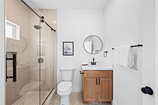 160 S Altadena Dr, Pasadena, CA 91107 - bathroom featuring a stall shower, toilet, baseboards, and vanity