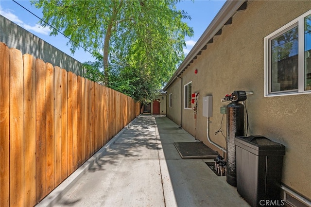 160 S Altadena Dr, Pasadena, CA 91107 - view of property exterior featuring stucco siding, fence, and a patio