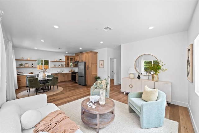 160 S Altadena Dr, Pasadena, CA 91107 - living area featuring light wood finished floors, recessed lighting, and baseboards