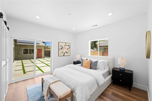 160 S Altadena Dr, Pasadena, CA 91107 - bedroom with a barn door, access to outside, wood finished floors, and recessed lighting