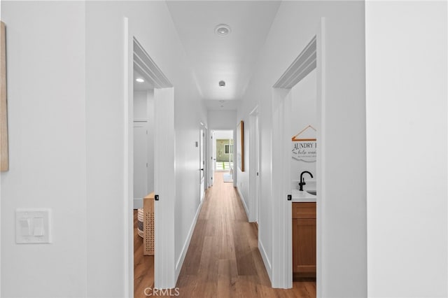 160 S Altadena Dr, Pasadena, CA 91107 - corridor with light wood-type flooring, baseboards, and recessed lighting