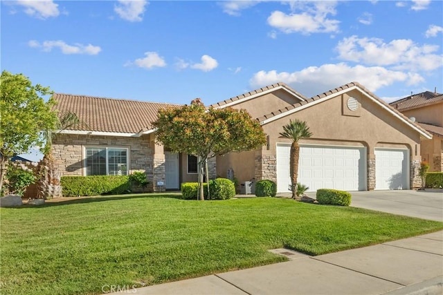 4064 Prestwick Ln, Palmdale, CA 93551 - view of front of house with stone siding, a garage, a front lawn, driveway, and a tile roof