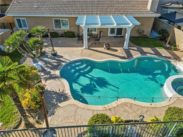 4064 Prestwick Ln, Palmdale, CA 93551 - view of pool featuring a fenced backyard, a pool with connected hot tub, a patio, and outdoor dining space
