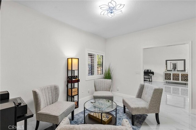 4064 Prestwick Ln, Palmdale, CA 93551 - sitting room featuring marble finish flooring and baseboards
