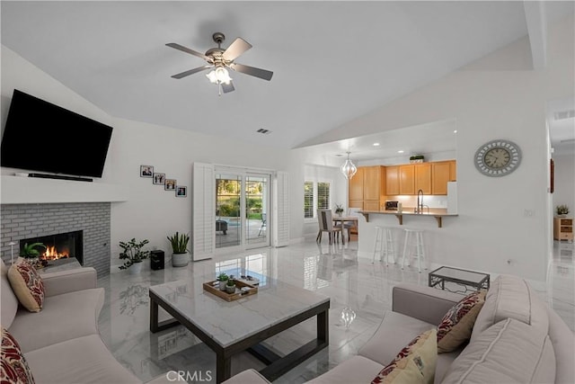 4064 Prestwick Ln, Palmdale, CA 93551 - living area with light marble finish flooring, ceiling fan, a fireplace, and high vaulted ceiling