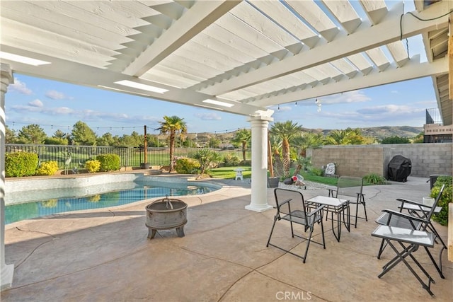 4064 Prestwick Ln, Palmdale, CA 93551 - fenced backyard featuring a fire pit, a pergola, a patio, and grilling area