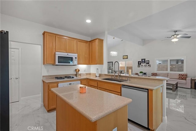 4064 Prestwick Ln, Palmdale, CA 93551 - kitchen featuring white appliances, a sink, light marble finish flooring, a peninsula, and open floor plan