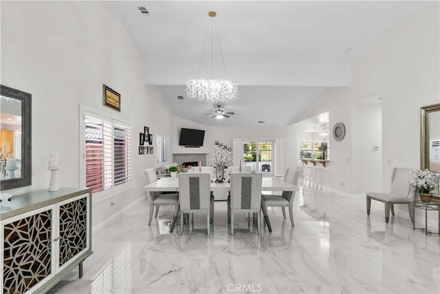 4064 Prestwick Ln, Palmdale, CA 93551 - dining space with a chandelier, baseboards, a ceiling fan, high vaulted ceiling, and marble tiled flooring