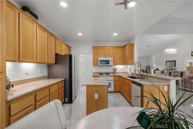 4064 Prestwick Ln, Palmdale, CA 93551 - kitchen featuring a sink, appliances with stainless steel finishes, light marble finish flooring, a kitchen island, and open floor plan