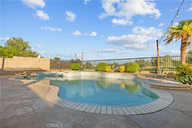 4064 Prestwick Ln, Palmdale, CA 93551 - view of swimming pool with a fenced backyard, a pool with connected hot tub, and a patio