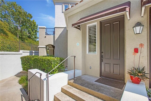 11 Via Pamplona, Rancho Santa Margarita, CA 92688 - property entrance with stucco siding and fence