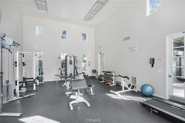 11 Via Pamplona, Rancho Santa Margarita, CA 92688 - gym featuring a towering ceiling, plenty of natural light, and baseboards