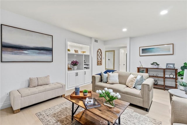 30 Yorktown, Irvine, CA 92620 - living area featuring recessed lighting, light wood-style floors, and built in shelves