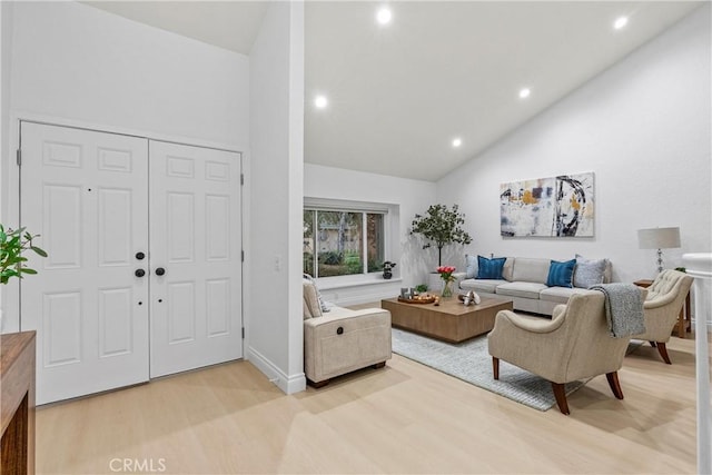 30 Yorktown, Irvine, CA 92620 - living room featuring light wood-style floors, recessed lighting, high vaulted ceiling, and baseboards
