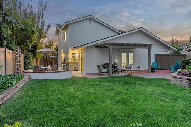30 Yorktown, Irvine, CA 92620 - rear view of property featuring stucco siding, a patio, and french doors