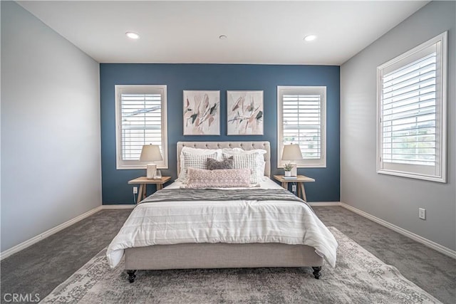 carpeted bedroom featuring multiple windows, baseboards, and recessed lighting