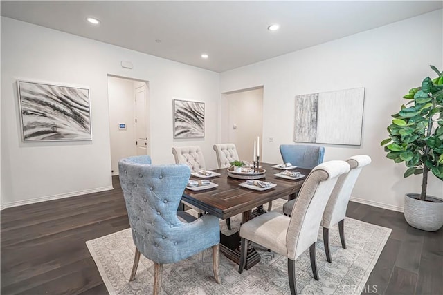dining area featuring dark wood-style flooring, baseboards, and recessed lighting
