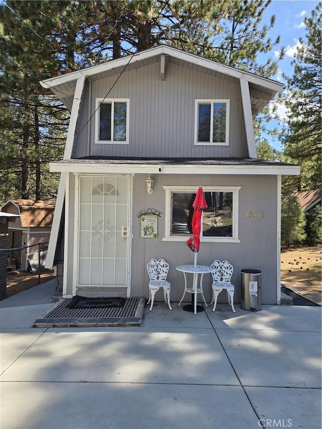 33337 Holcomb Creek Dr, Green Valley Lake, CA 92341 - back of house featuring a patio area