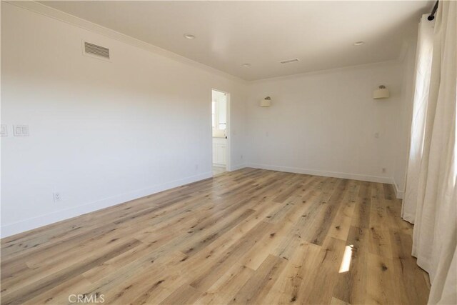 12539 Presnell St, Los Angeles, CA 90066 - spare room featuring ornamental molding, light wood-style floors, and baseboards
