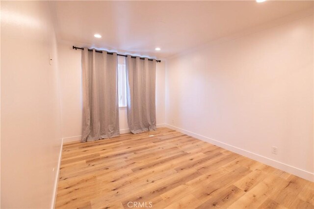 12539 Presnell St, Los Angeles, CA 90066 - unfurnished room featuring recessed lighting, wood finished floors, and baseboards