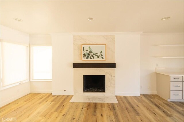 12539 Presnell St, Los Angeles, CA 90066 - unfurnished living room featuring wood finished floors, ornamental molding, a premium fireplace, baseboards, and recessed lighting
