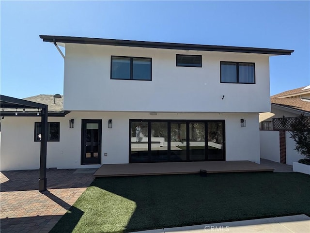 12539 Presnell St, Los Angeles, CA 90066 - back of house featuring stucco siding, a patio area, and fence