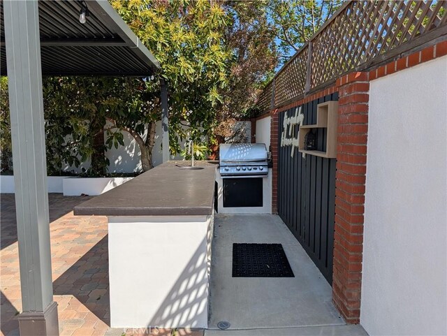 12539 Presnell St, Los Angeles, CA 90066 - view of patio / terrace featuring grilling area, area for grilling, and a sink