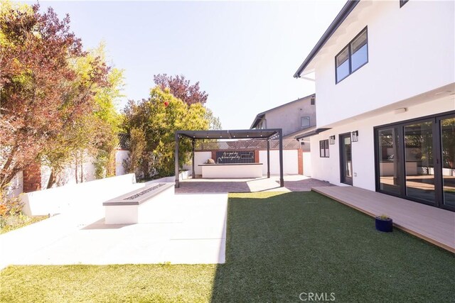 12539 Presnell St, Los Angeles, CA 90066 - view of yard with a patio and a fire pit