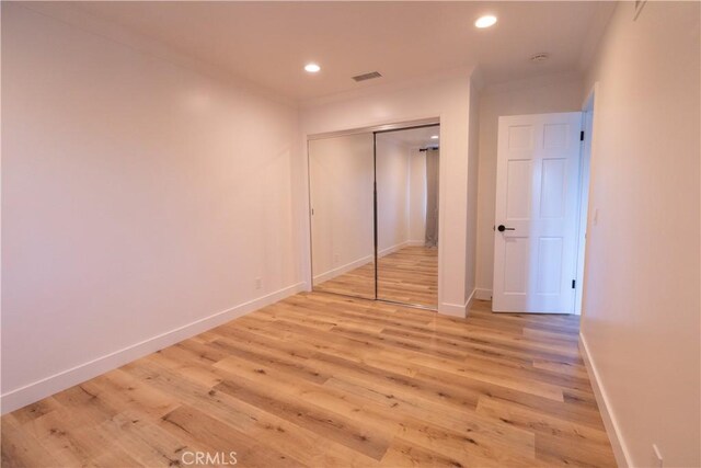 12539 Presnell St, Los Angeles, CA 90066 - unfurnished bedroom with light wood-type flooring, recessed lighting, baseboards, and a closet