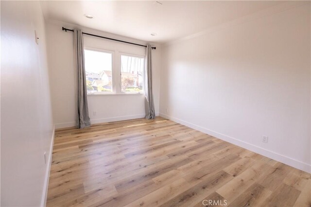 12539 Presnell St, Los Angeles, CA 90066 - empty room with light wood finished floors and baseboards