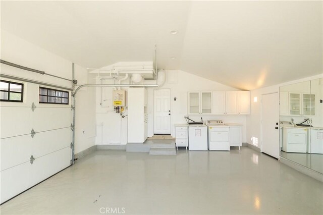 12539 Presnell St, Los Angeles, CA 90066 - garage featuring separate washer and dryer and baseboards
