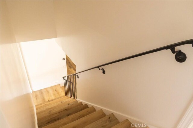 12539 Presnell St, Los Angeles, CA 90066 - stairs featuring wood finished floors