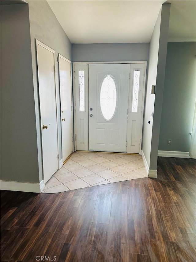 25690 Onate Dr, Moreno Valley, CA 92557 - foyer entrance featuring baseboards and wood finished floors