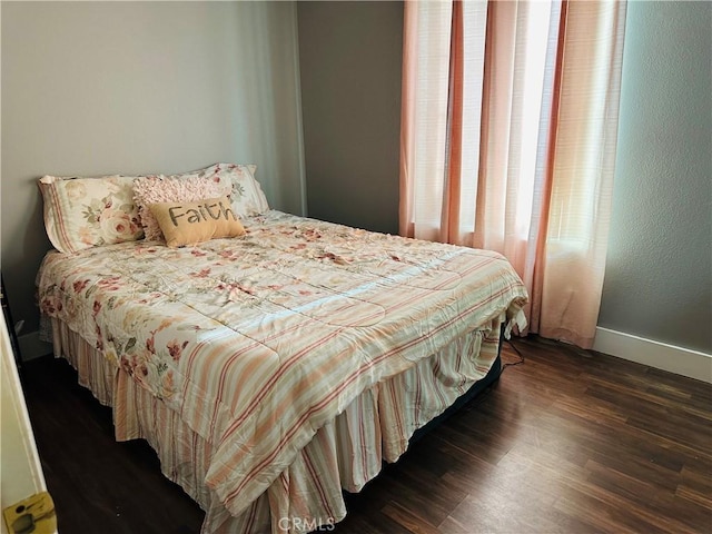 25690 Onate Dr, Moreno Valley, CA 92557 - bedroom with dark wood-style flooring and baseboards