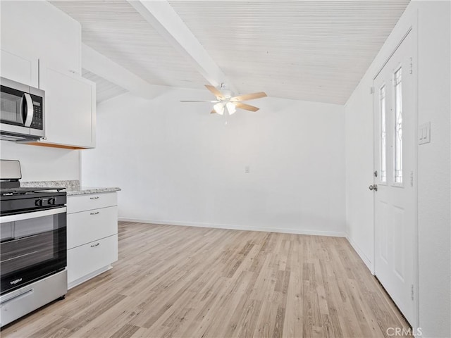 15533 Heartsease Ln, Victorville, CA 92395 - kitchen with appliances with stainless steel finishes, ceiling fan, white cabinetry, light wood finished floors, and baseboards