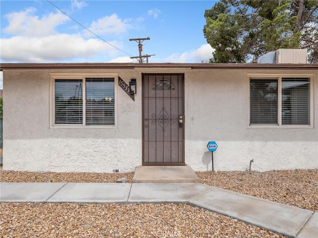 15533 Heartsease Ln, Victorville, CA 92395 - view of exterior entry with stucco siding