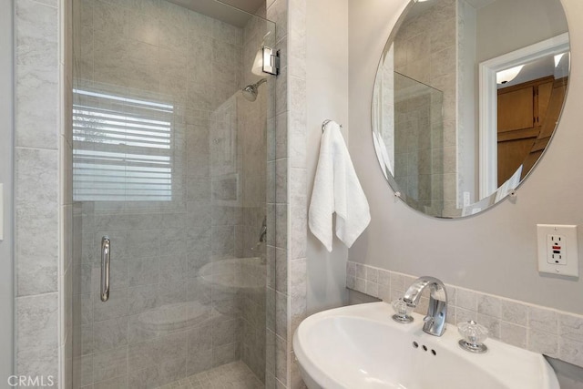 14691 Leon Pl, Tustin, CA 92780 - full bath with a shower stall, a sink, and tile walls