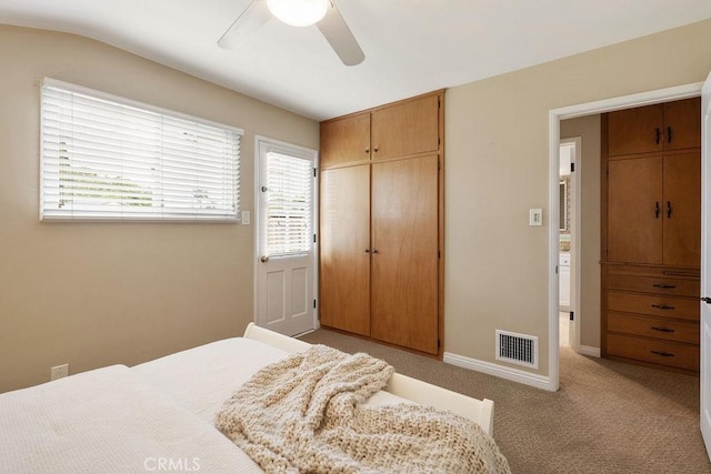 14691 Leon Pl, Tustin, CA 92780 - bedroom with a closet, light carpet, baseboards, and ceiling fan