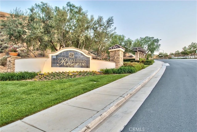 16418 Village Meadow Dr, Riverside, CA 92503 - community / neighborhood sign with a lawn