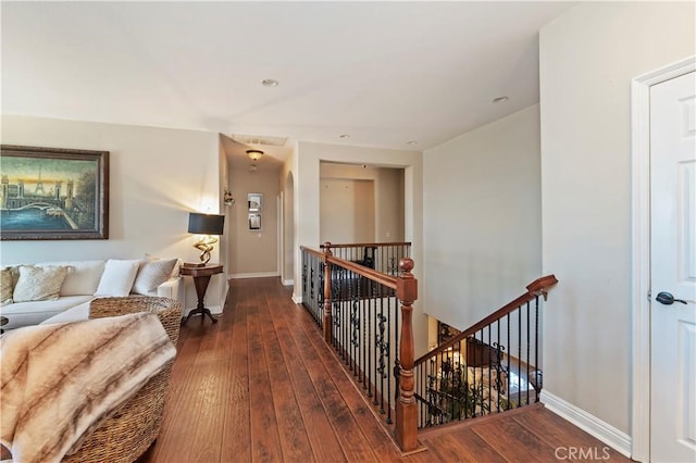 16418 Village Meadow Dr, Riverside, CA 92503 - hallway featuring an upstairs landing, wood-type flooring, and baseboards