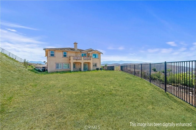 16418 Village Meadow Dr, Riverside, CA 92503 - back of house featuring stucco siding and a chimney
