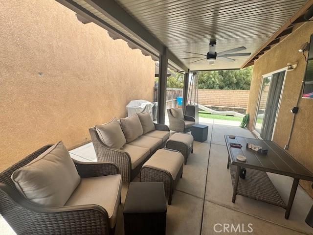 1421 Alta Palma Rd, Perris, CA 92571 - view of patio with an outdoor living space, fence, and a ceiling fan