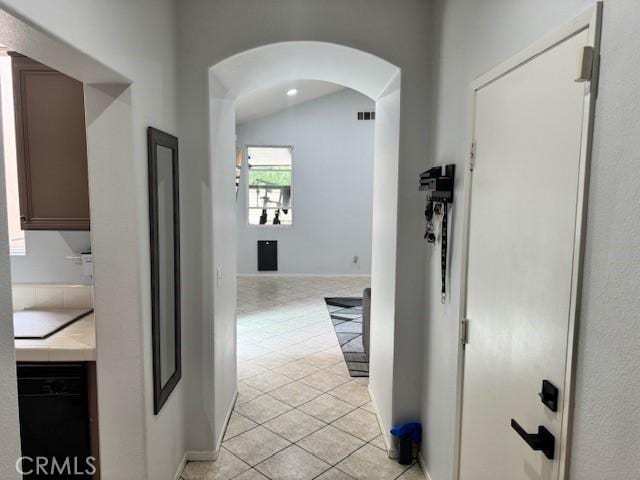 1421 Alta Palma Rd, Perris, CA 92571 - hall with arched walkways and light tile patterned flooring