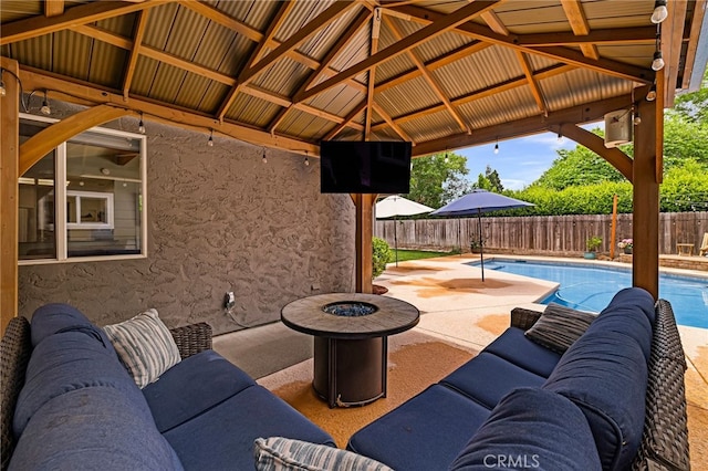 3171 Eagle Lake Ct, Chico, CA 95973 - fenced backyard with a patio area, a gazebo, and an outdoor living space with a fire pit