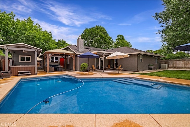3171 Eagle Lake Ct, Chico, CA 95973 - view of pool featuring a gazebo, a patio, outdoor lounge area, and central air condition unit