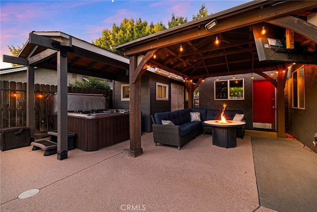 3171 Eagle Lake Ct, Chico, CA 95973 - view of patio / terrace featuring a gazebo, a hot tub, and an outdoor living space with a fire pit